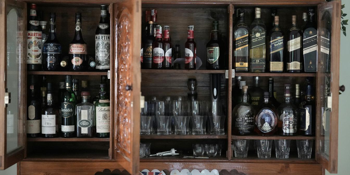 An organised Persian pantry with correctly stored dry ingredients