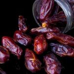 Bowl of whole dates ready to eat as part of a balanced diet