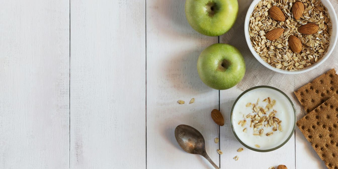 Dates served with yoghurt, pistachios and fresh fruit