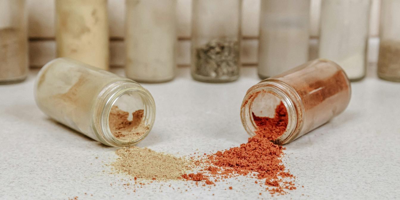Middle Eastern herbs, spice blends and saffron stored in glass jars