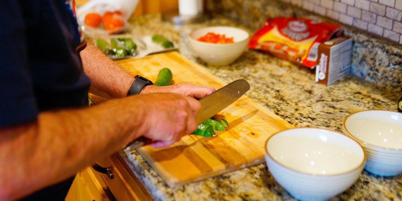 Preparing whole dried limes before adding them to a stew