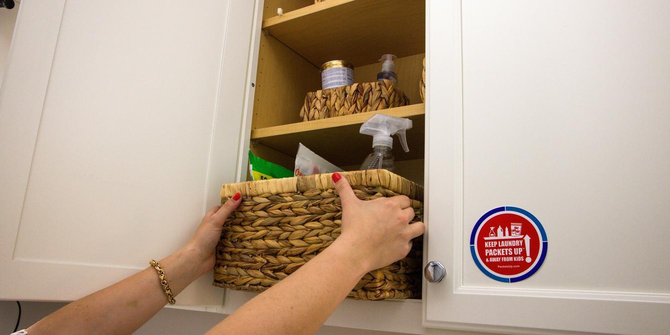 Cupboard filled with rice, pulses, herbs, spices and preserved ingredients
